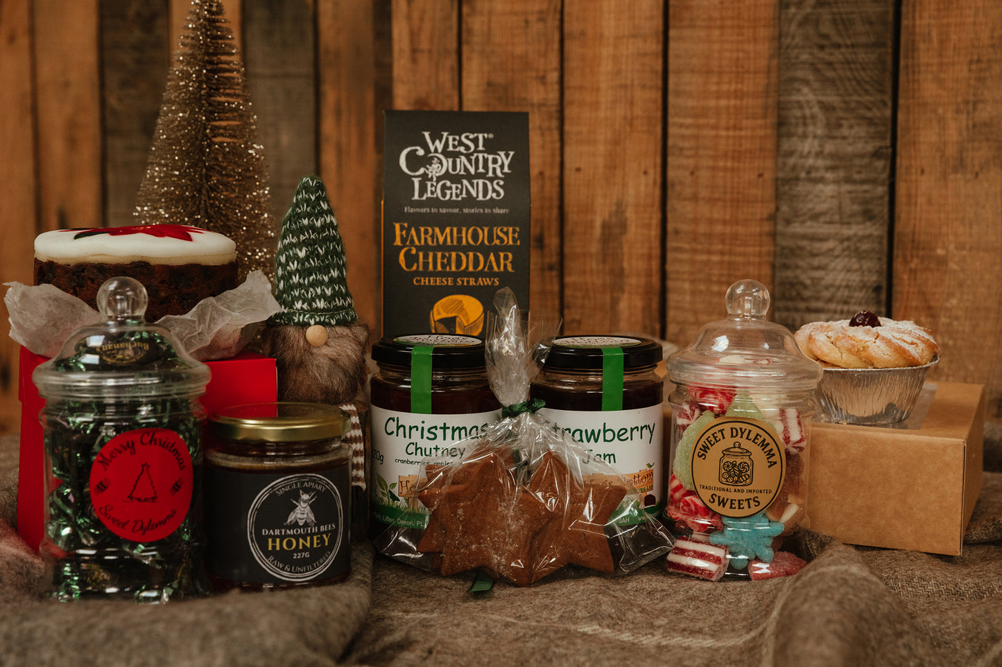 Assorted food items including jam, chutney, mince pie and honey